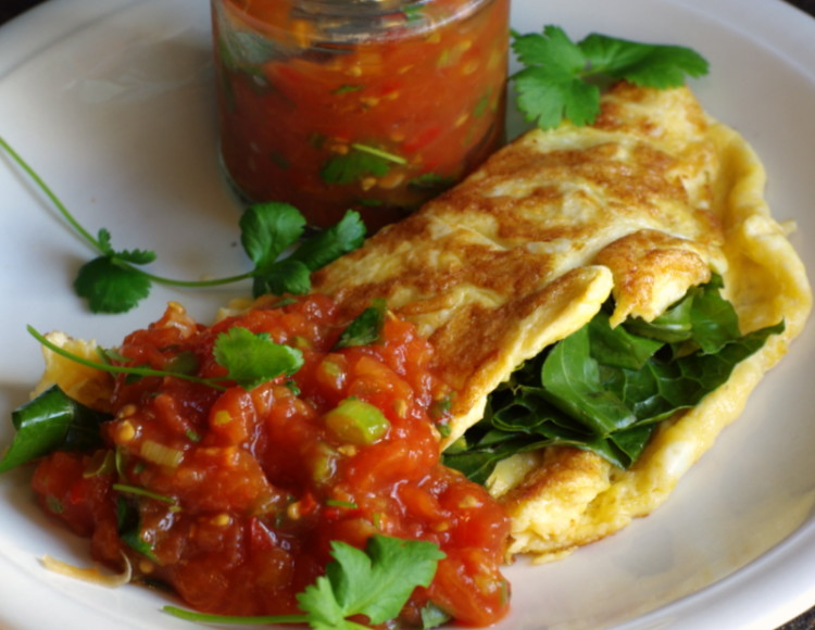 Omelet with steamed greens and Charred tomato salsa
